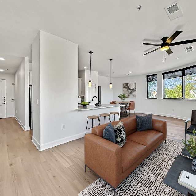 Instrata Upper Kirby - Open-concept living room and kitchen